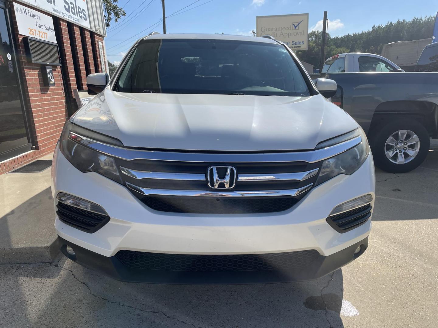 2016 White /Beige Honda Pilot EXL 2WD (5FNYF5H58GB) with an 3.5L V6 SOHC 24V engine, 6-Speed Automatic transmission, located at 204 Hwy. 16 East, Carthage, MS, 39051, (601) 267-7277, 0.000000, 0.000000 - Photo#2