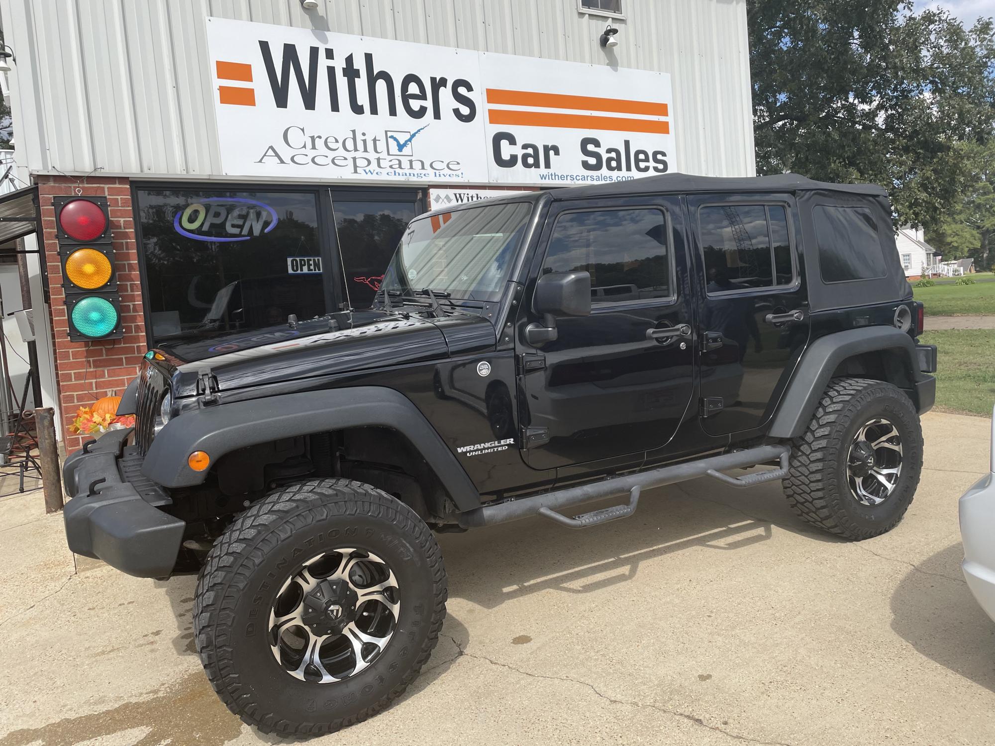 photo of 2015 Jeep Wrangler Unlimited Sport 4WD