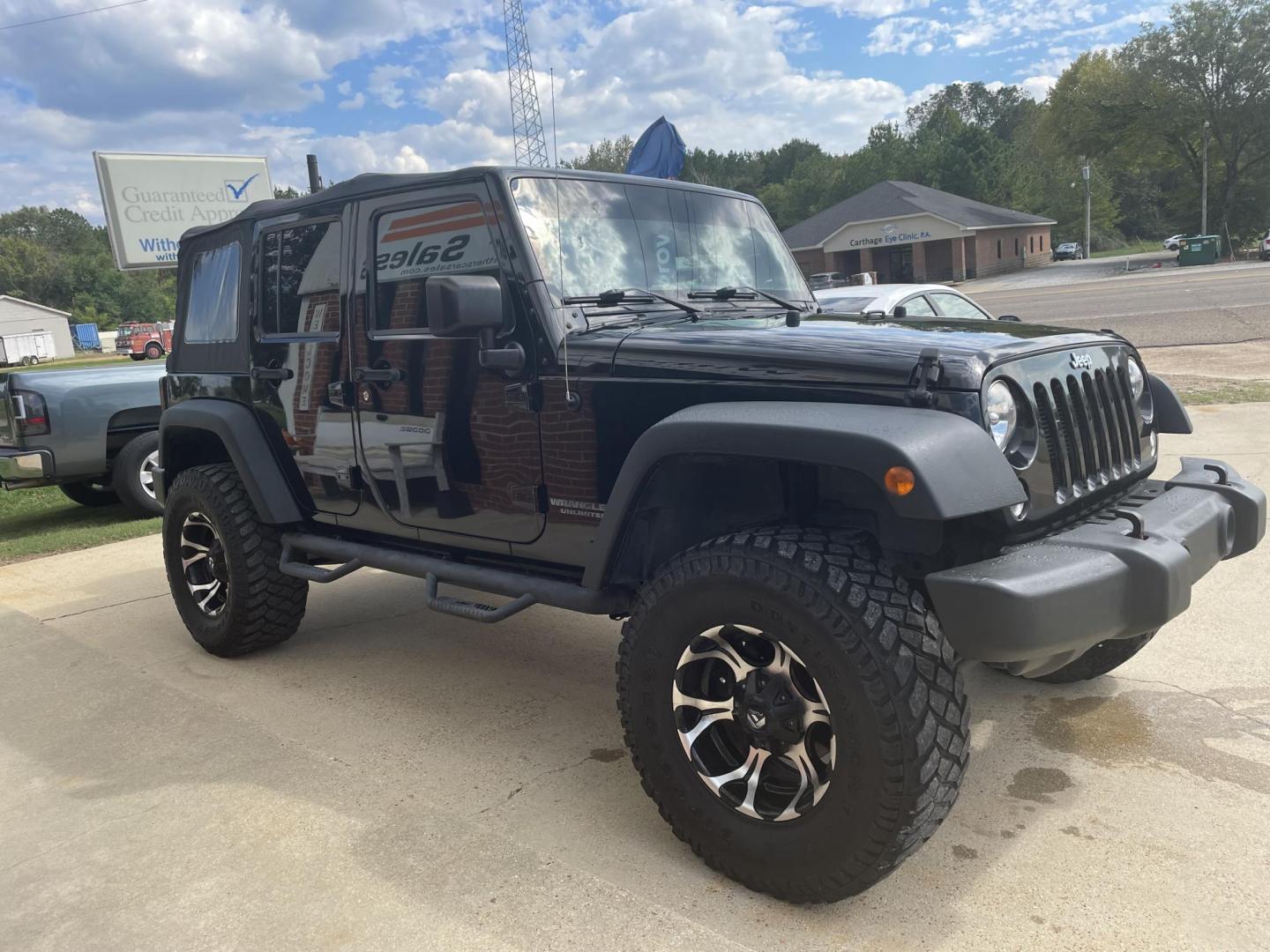 2015 Black /Black Jeep Wrangler Unlimited Sport 4WD (1C4BJWDG3FL) with an 3.6L V6 DOHC 24V FFV engine, Auto transmission, located at 204 Hwy. 16 East, Carthage, MS, 39051, (601) 267-7277, 0.000000, 0.000000 - Photo#1